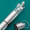 Stainless steel ear pick tools in an open capsule keychain case
