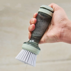 Mint green soap dispensing dish brush product view with bristle head