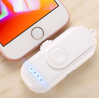 Mini Magnetic Power Bank – next to iPhone showing size