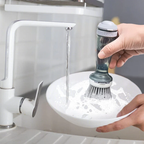 Dish brush with soap dispenser handle showing bristle and sponge pad replacement heads