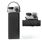 Black collapsible silicone water bottle expanded full size and collapsed flat comparison